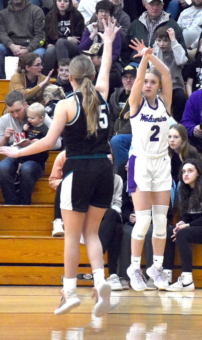 Wolverine junior Maddie Weston (2) takes a 3-pointer from the left wing against Southwest Valley, in a regional semifinal at Nodaway Valley Friday, Feb. 16.