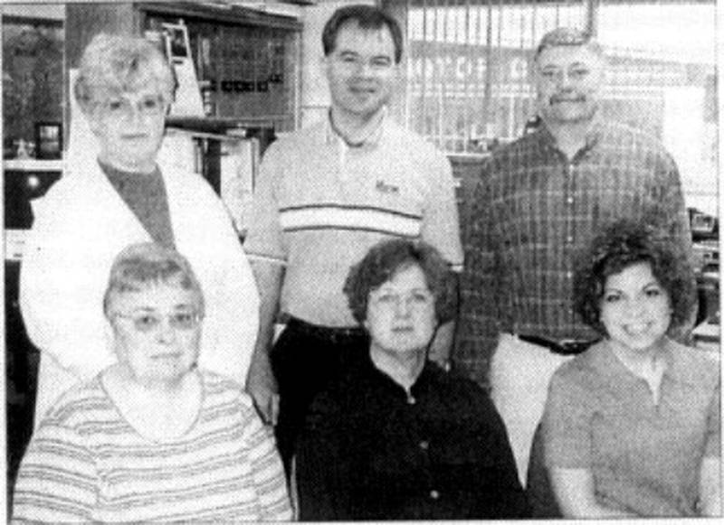 The Creston News Advertiser editorial department is responsible for the stories, photos and layout of the daily newspaper. Front, from left, are: Mary Brunner, newsroom clerk; Stephani Finley, assistant managing editor; Jenny Stahr, staff reporter. Back row, from left, are: June Bower, staff reporter; John Van Nostrand, managing editor and Larry Peterson, feature writer.