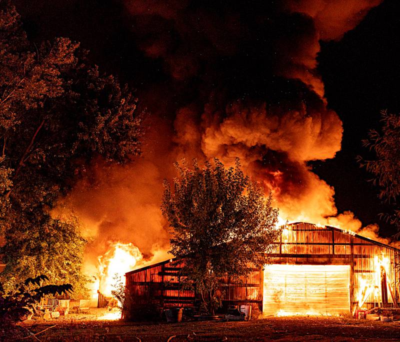 Creston and other area fire departments respond to a structure fire early Friday southwest of Creston. Residents of the house safely evacuated.