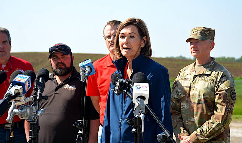 Iowa Gov. Kim Reynolds speaks today in Greenfield, the day after a tornado caused extensive damage, injuries and deaths Tuesday afternoon. An official number of injuries and deaths has not been made as people are still being searched.