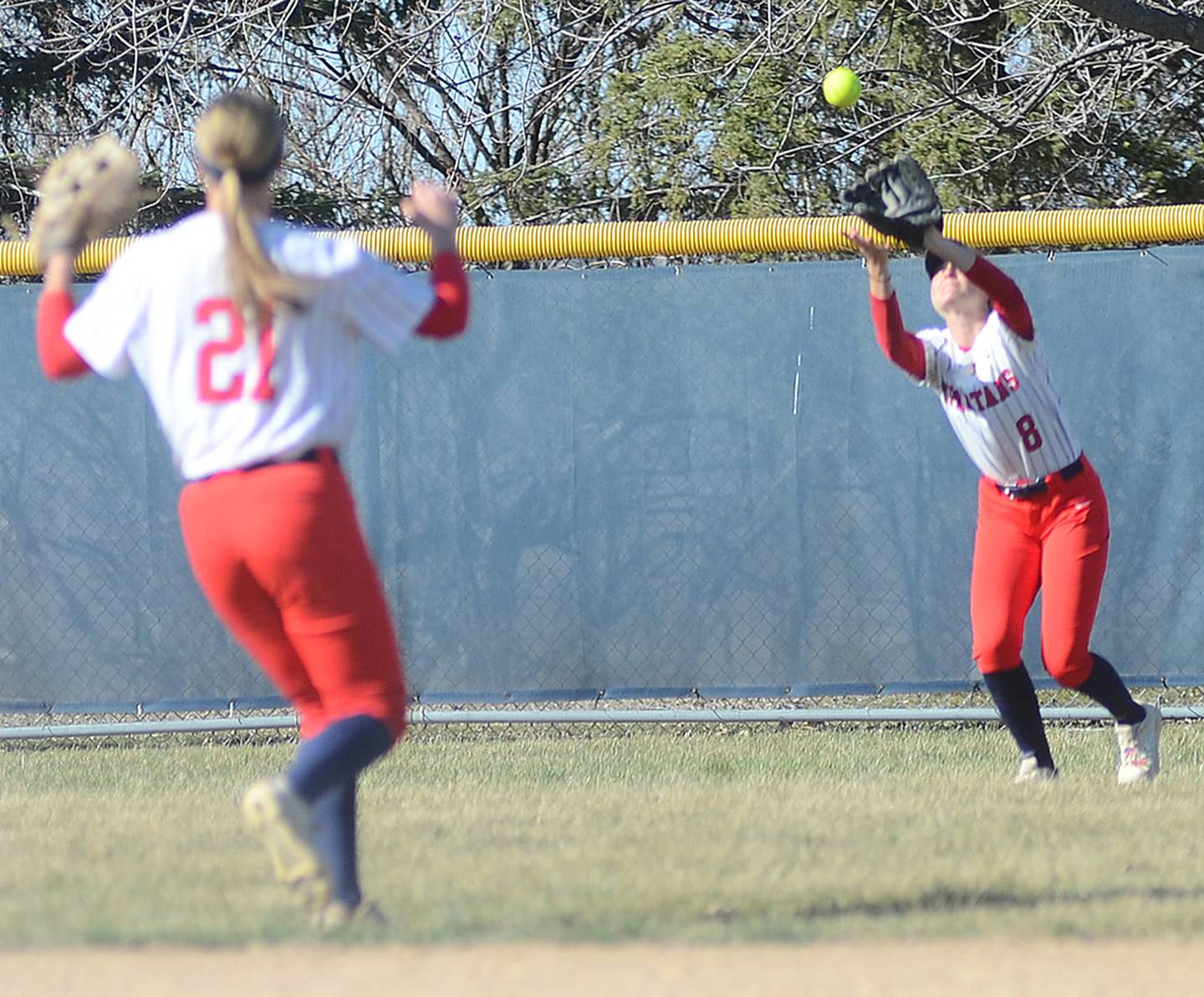Outfielder Haley Meyer of Orient-Macksburg catches a flyball during SWCC's game two victory Tuesday. Meyer had two putouts in the 5-3 win.