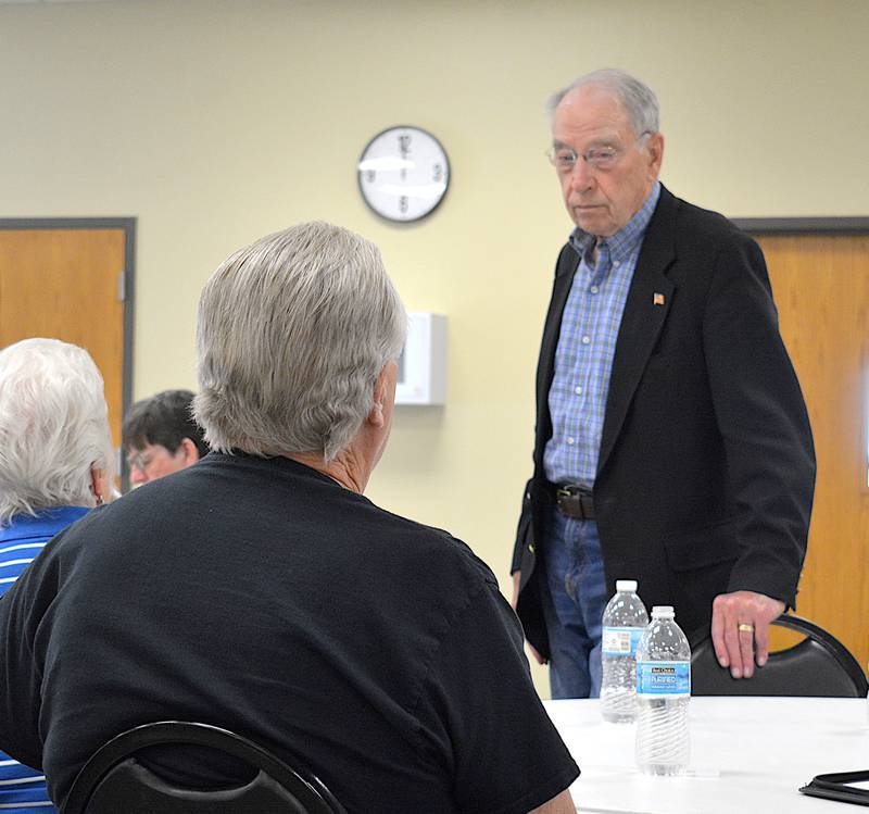 Senator Grassley listens to a local Iowan's question at a town hall lunch in Lenox Wednesday, May 29.
