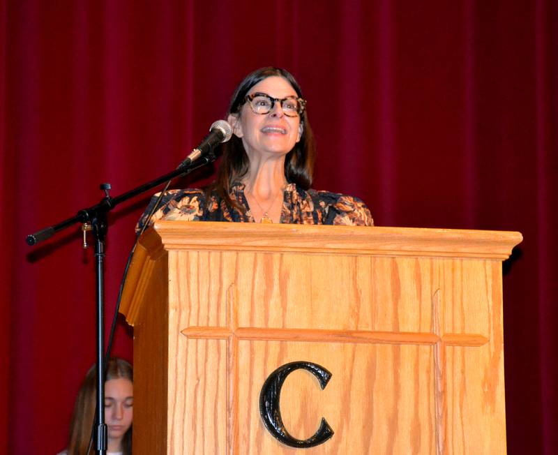 Creston Hall of Fame inductee Amy Higgins speaks at the induction ceremony.