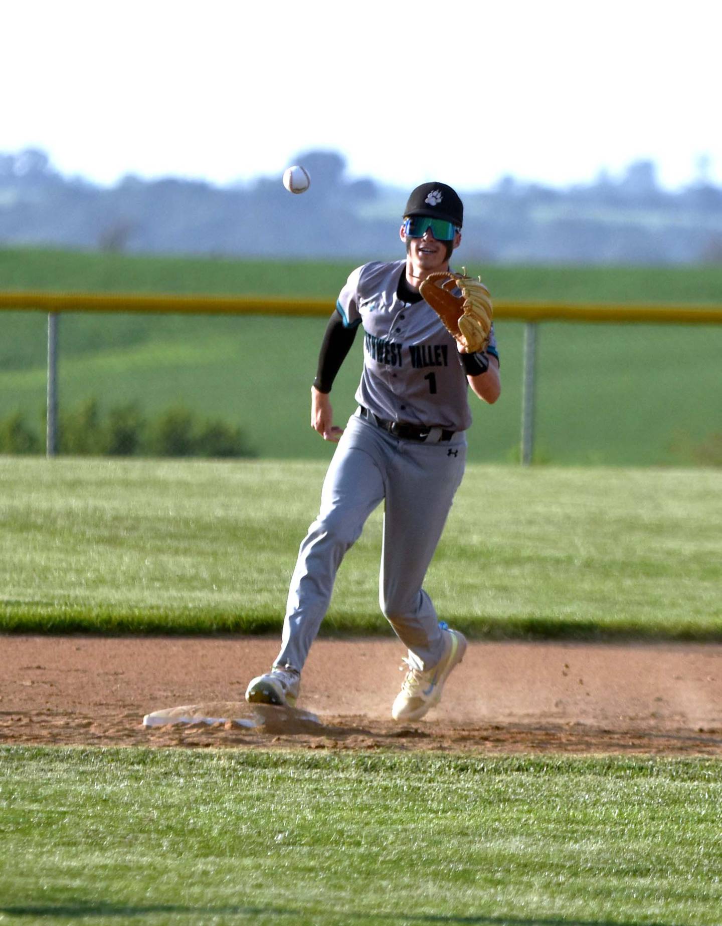 Southwest Valley senior Roman Keefe catches a throw from Beau Johnston to get East Union pinch-runner Omar Lara out at second base on a single grounder by Logan Findley.