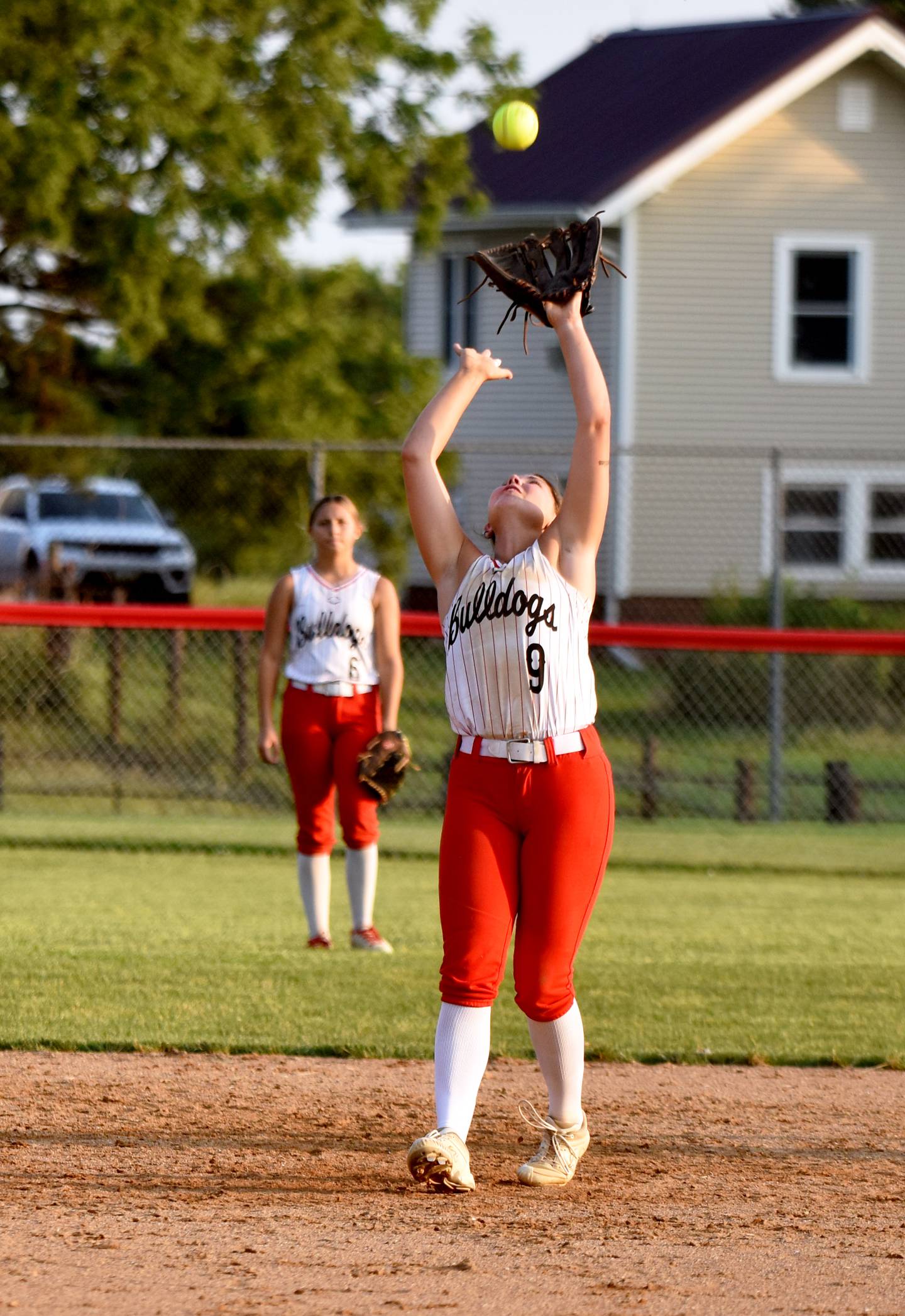Senior shortstop Kinsey Eslinger catches a fly ball.