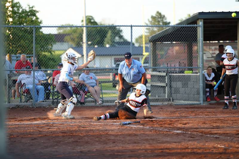 A Raiderette slides into home in a 7-6 win against East Union.