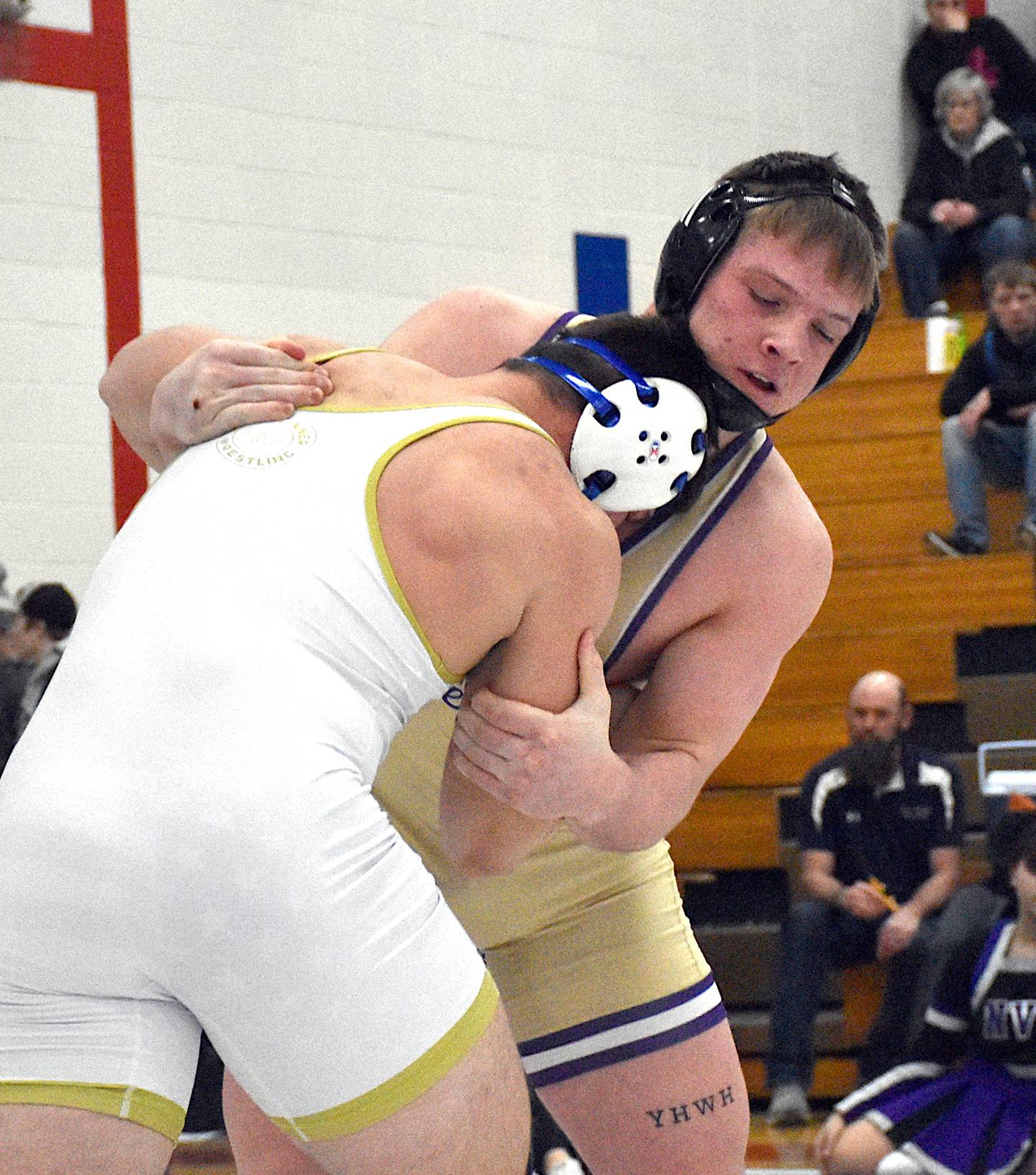 Ashton Honnold looks to drop his opponent, Eli Green from Interstate 35, to his knees in their finals match at the district tournament Feb. 10 in Truro.