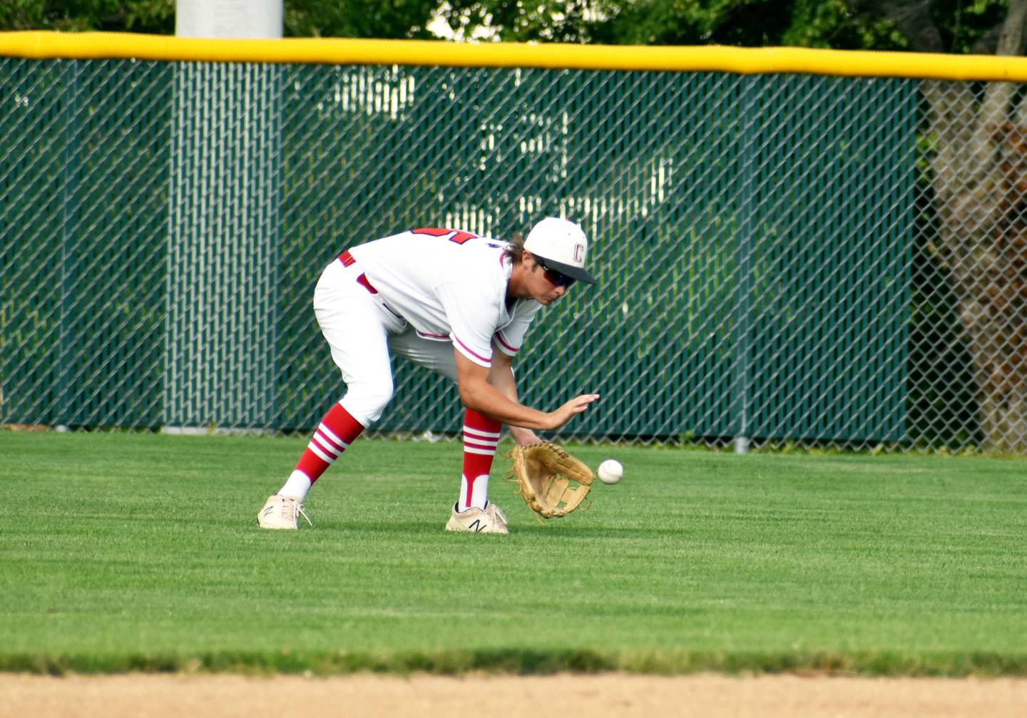 Senior centerfielder McCoy Haines fields a ball in game two.
