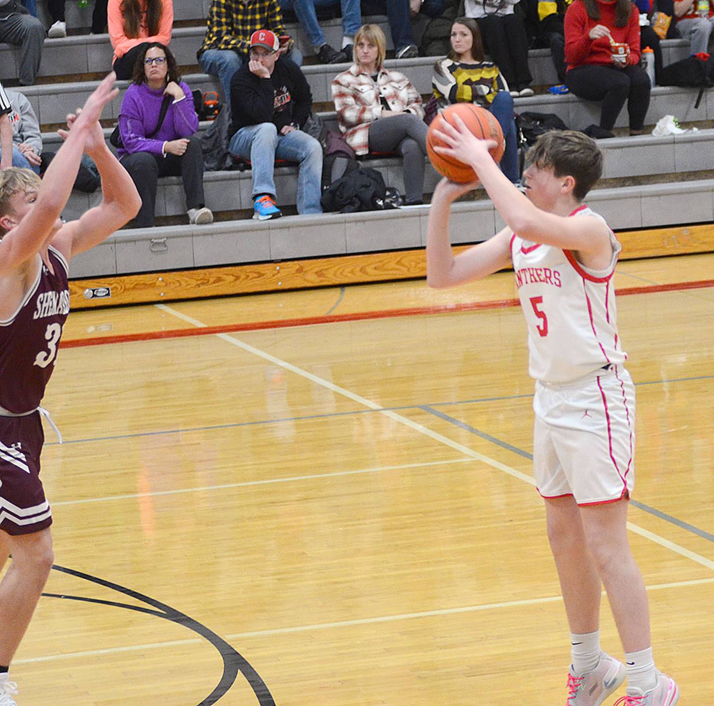 Creston freshman Rhett Driskell shoots from the 3-point line against Shenandoah Tuesday. Driskell made two 3-pointers in finishing with six points.