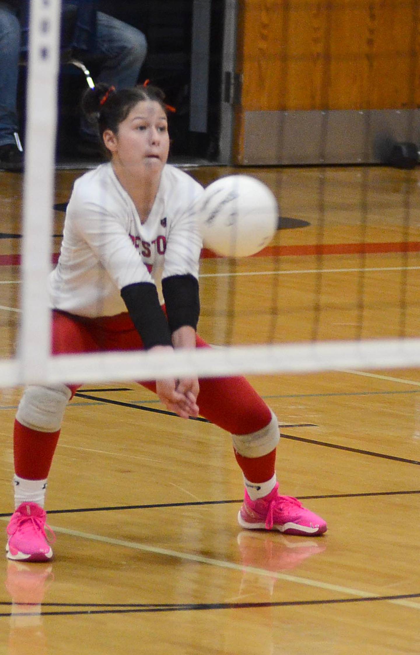 Creston libero Mila Kuhns receives a Red Oak serve Thursday. Kuhns had a team-high 10 digs for the Panthers.