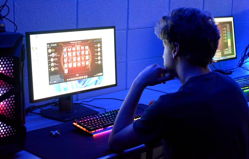 Kade Weis, one of the members East Union Esports team contemplates his choice of character in the champion select screen before a match.