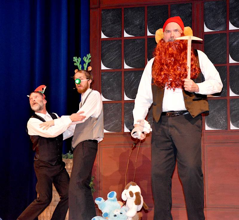 Bull Mullin, right, portrays Yukon Cornelius as Justin Kendrick, left, and Jacob Rutz reenact "Rudolph the Red Nose Reindeer" in Crest Area Theatre's "Every Christmas Story Ever Told." Performances are this weekend. The Creston News Advertiser thanks Crest Area Theatre for pictures during rehearsals this week.