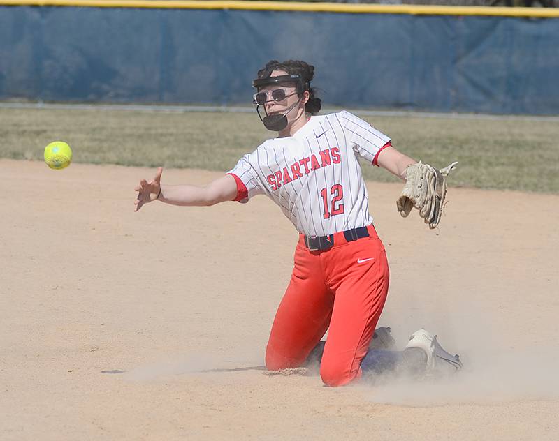 Southwestern second baseman Haley Keller tosses to first base after a diving stop of a groundball in the first game of Tuesday's doubleheader.