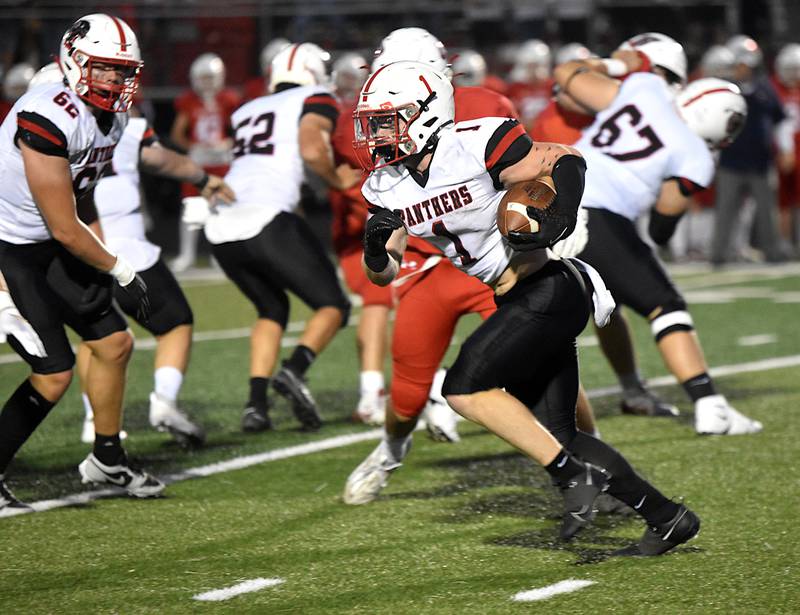 Creston's Weston Trapp; looks for open space Friday in the Panthers' loss at Ballard. Trapp dominated the Panthers' offensive production.