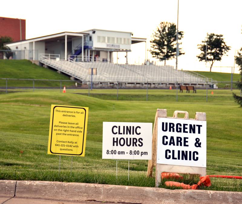 Signs show where Adair County Health System has its urgent care and clinic, at the elementary school in Greenfield, while the hospital is repaired.