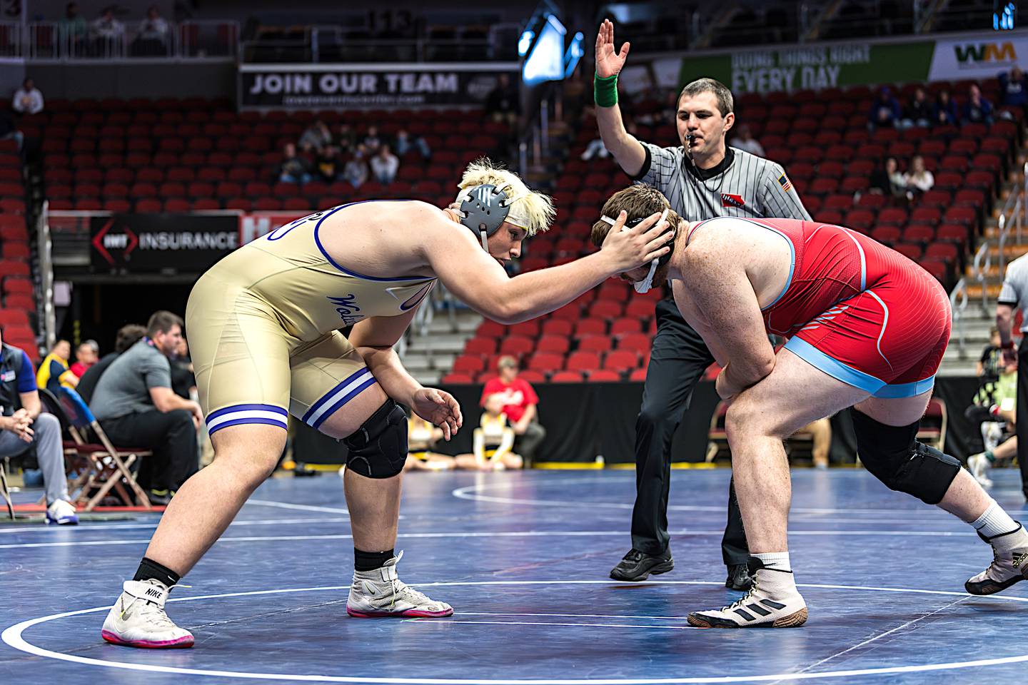 NV/OM heavyweight Trent Warner looks for his next shot against Cody Fox of East Buchanan in the bronze medal match at the state tournament.
