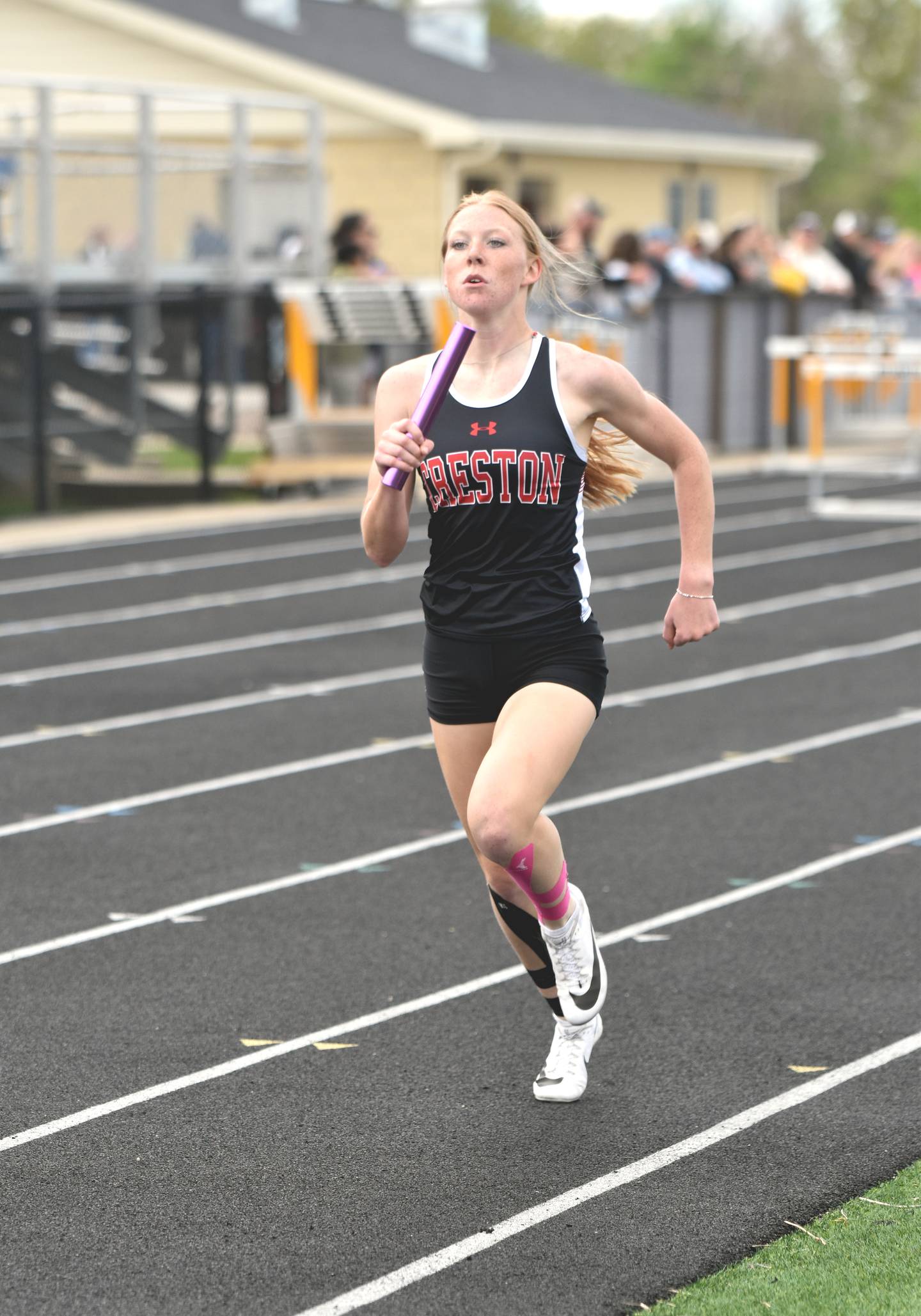 Avery Staver runs the third leg of the 4x800m relay. She qualified in both the relay and the 200m dash.