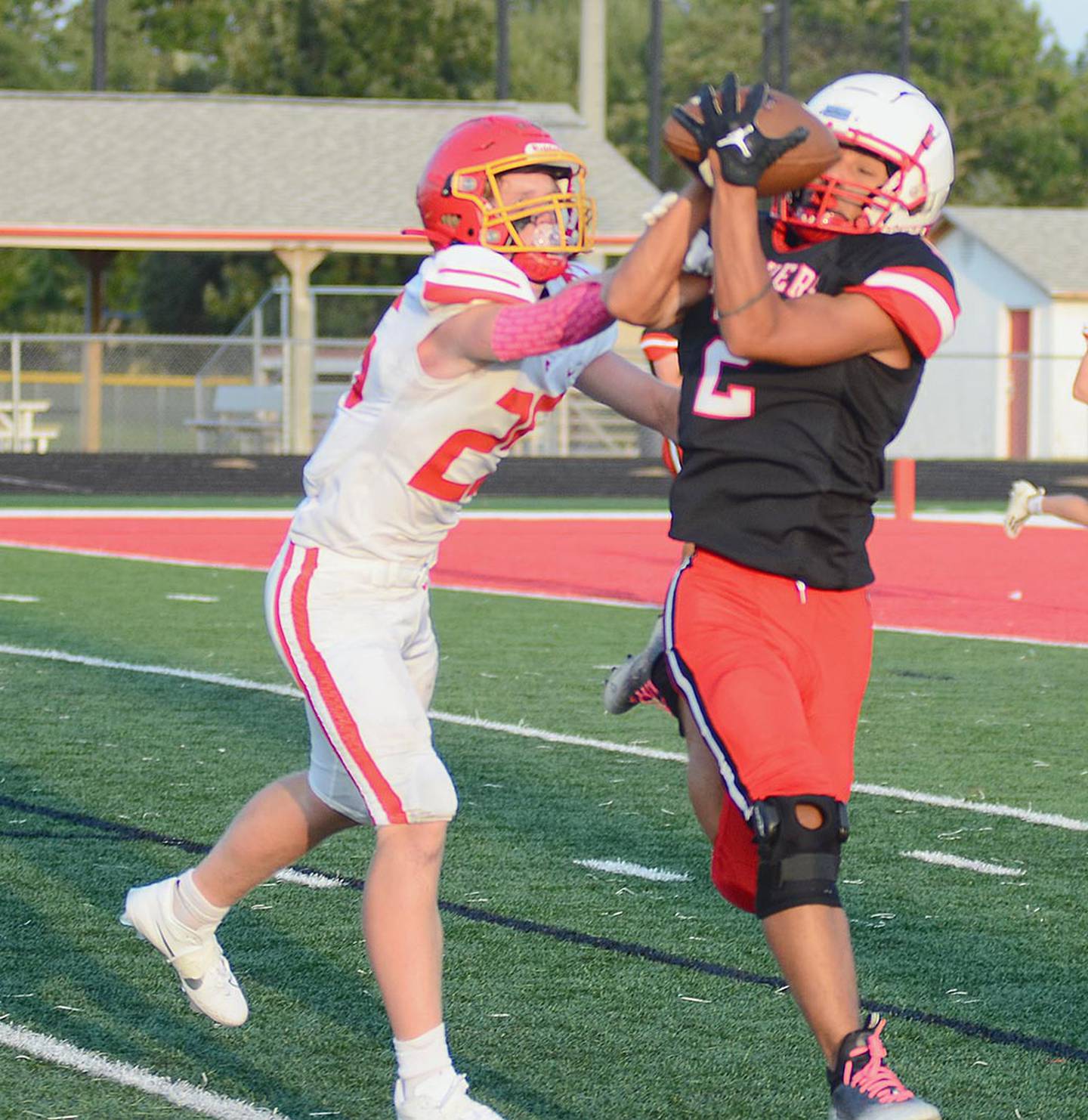 Creston receiver Xander Drake makes a catch against Carlisle in last year's scrimmage. Drake returns this season after missing the 2023 campaign with a knee injury.