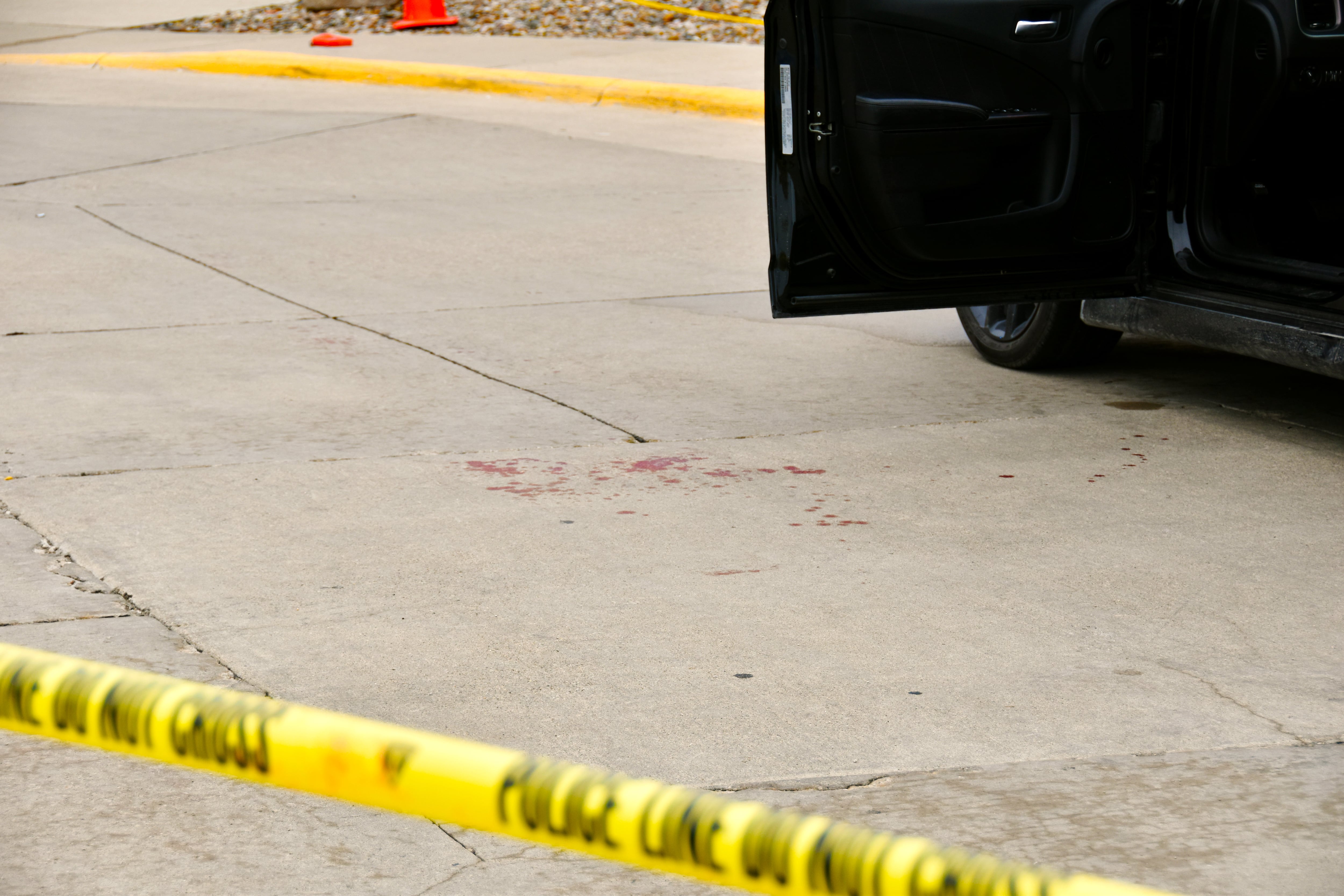 Blood is splattered in a roped off crime scene where the victim of a shooting Thursday morning drove themselves to Greater Regional Medical Center.