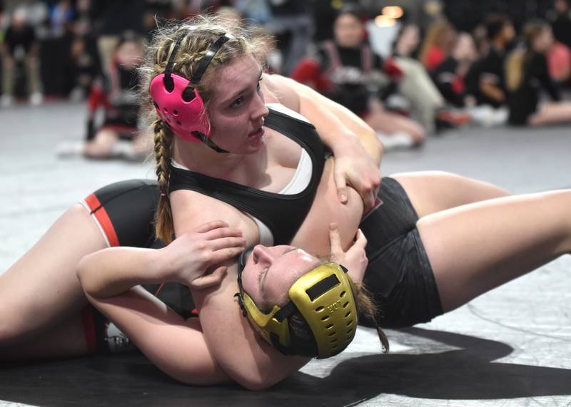 Grace Britten (170) of S.W.A.T. pins Desiree Breuer of Le Mars with a head lock in the second round Thursday.