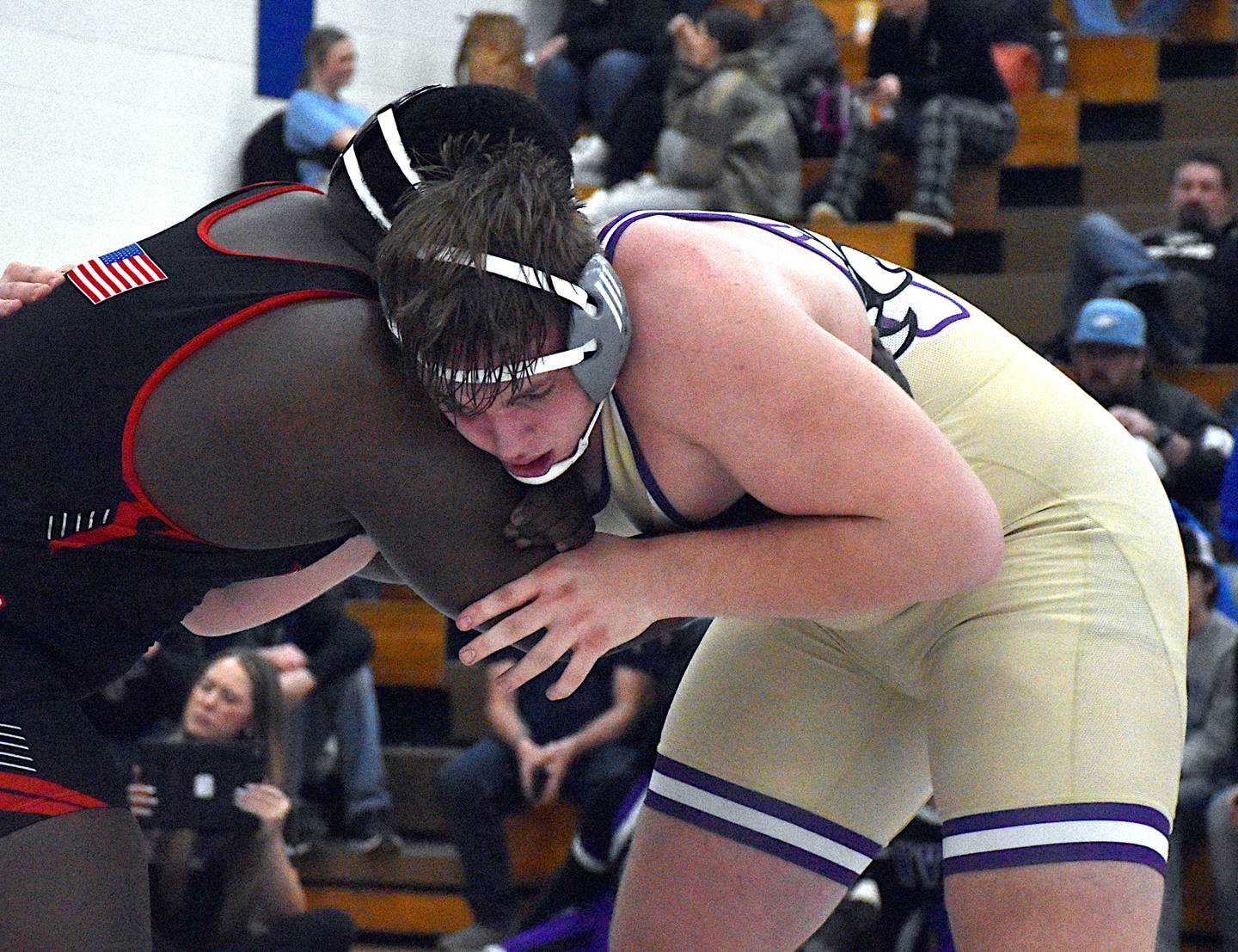 Wolverine junior Trent Warner wrestles an opponent from Cardinal of Eldon in the finals at districts Feb. 10 in Truro.