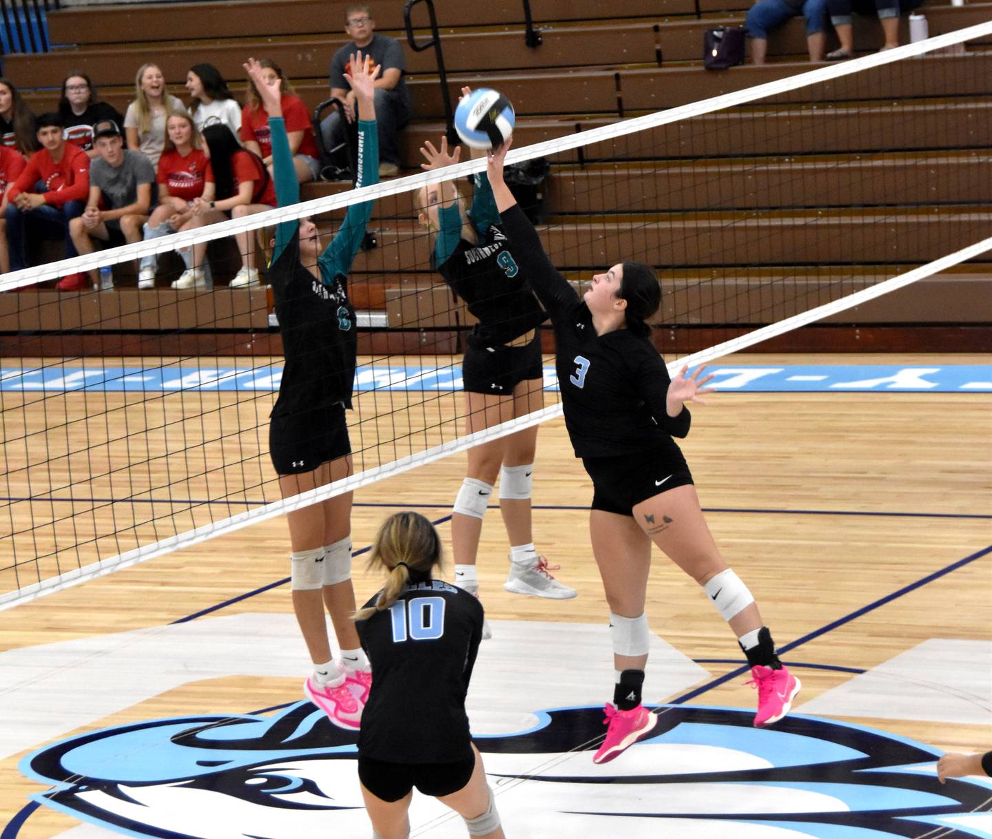 East Union senior Kinzey Ripperger puts an attack over Southwest Valley defenders. The Eagles fell 2-0 to both Mount Ayr and Southwest Valley.