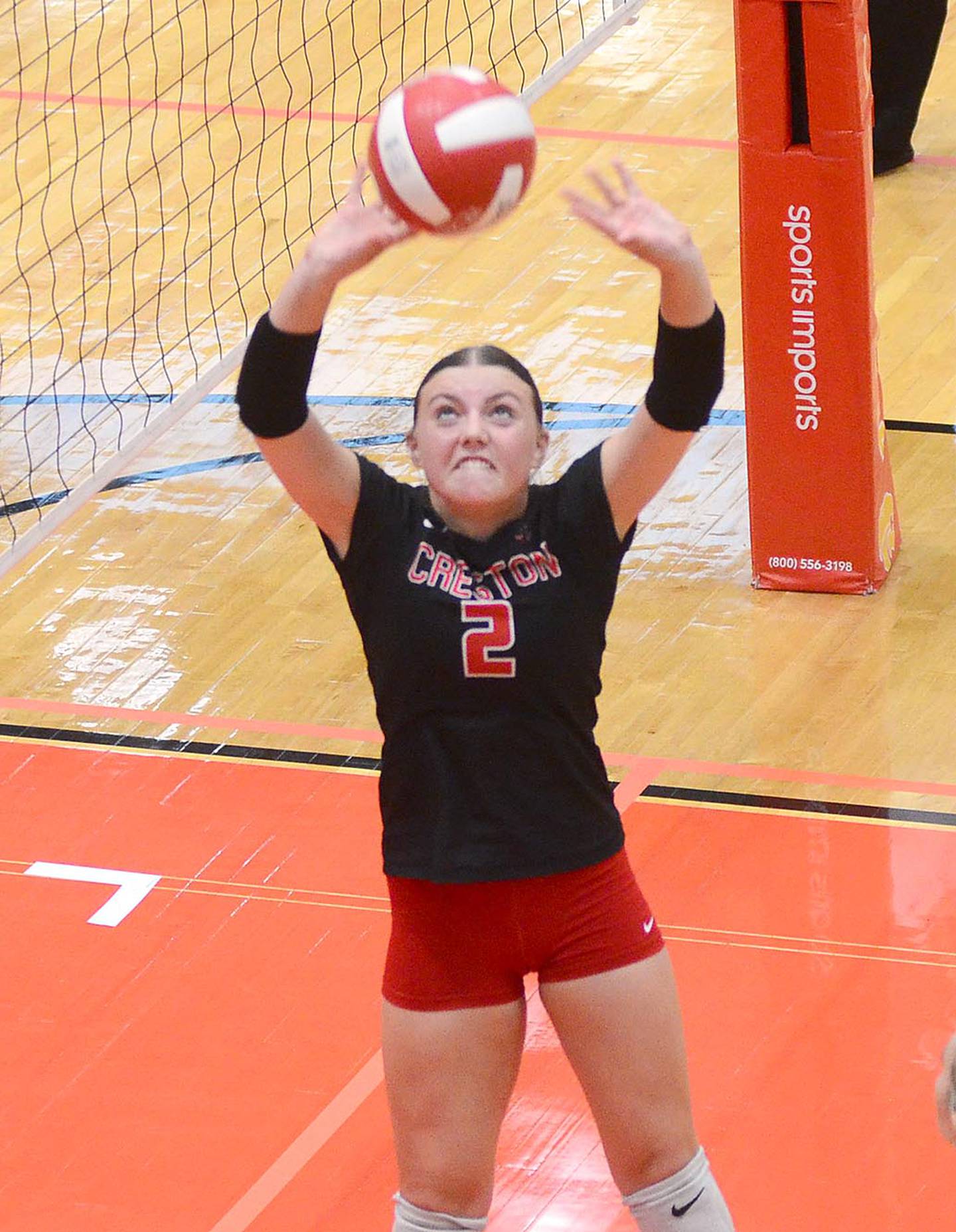 Creston junior Hollyn Rieck sets for a teammate during Thursday's match against fourth-ranked Carlisle. Rieck had 15 kills in the three matches against Oskaloosa, West Marshall and Carlisle. She also had five setting assists.