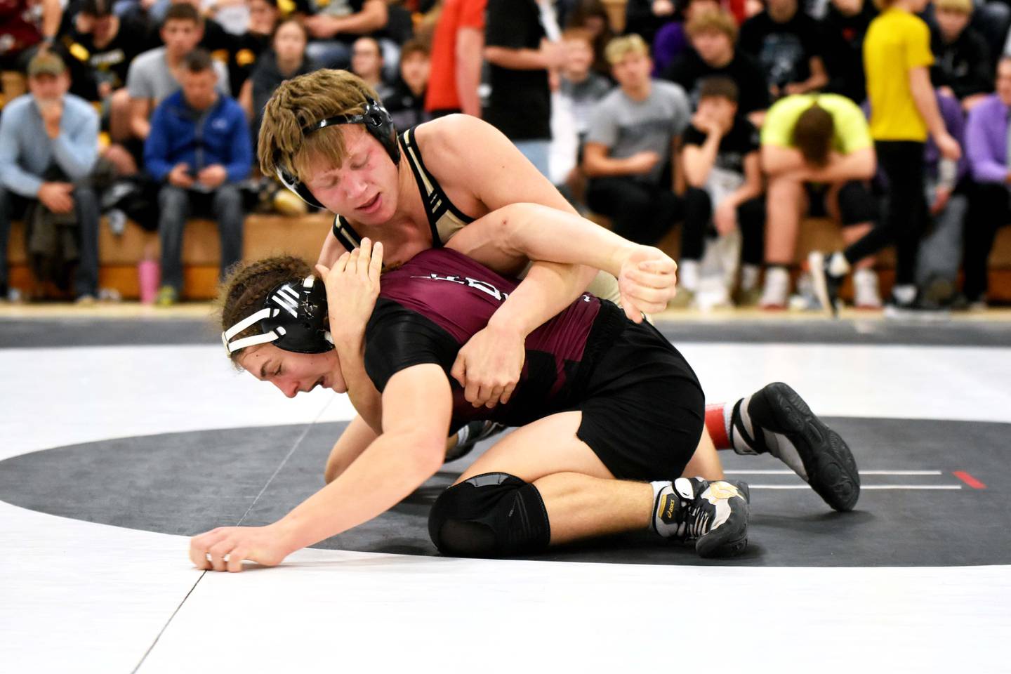 Austin Evans gets control of Uriah Fry of Clarke in the 144 lbs finals Saturday in Corning at the 69th annual John J. Harris tournament. Evans pinned Fry with only five seconds remaining in the first period to win the title.