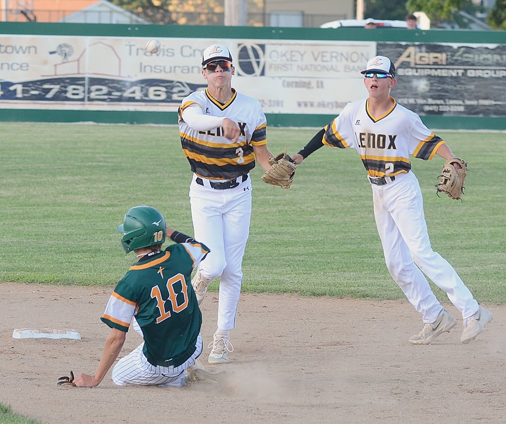 Lenox shortstop Dawson Evans throws to first base to complete a double play in the third inning of Tuesday's district game. Evans hit a double and scored two runs in the 4-0 win over St. Albert.