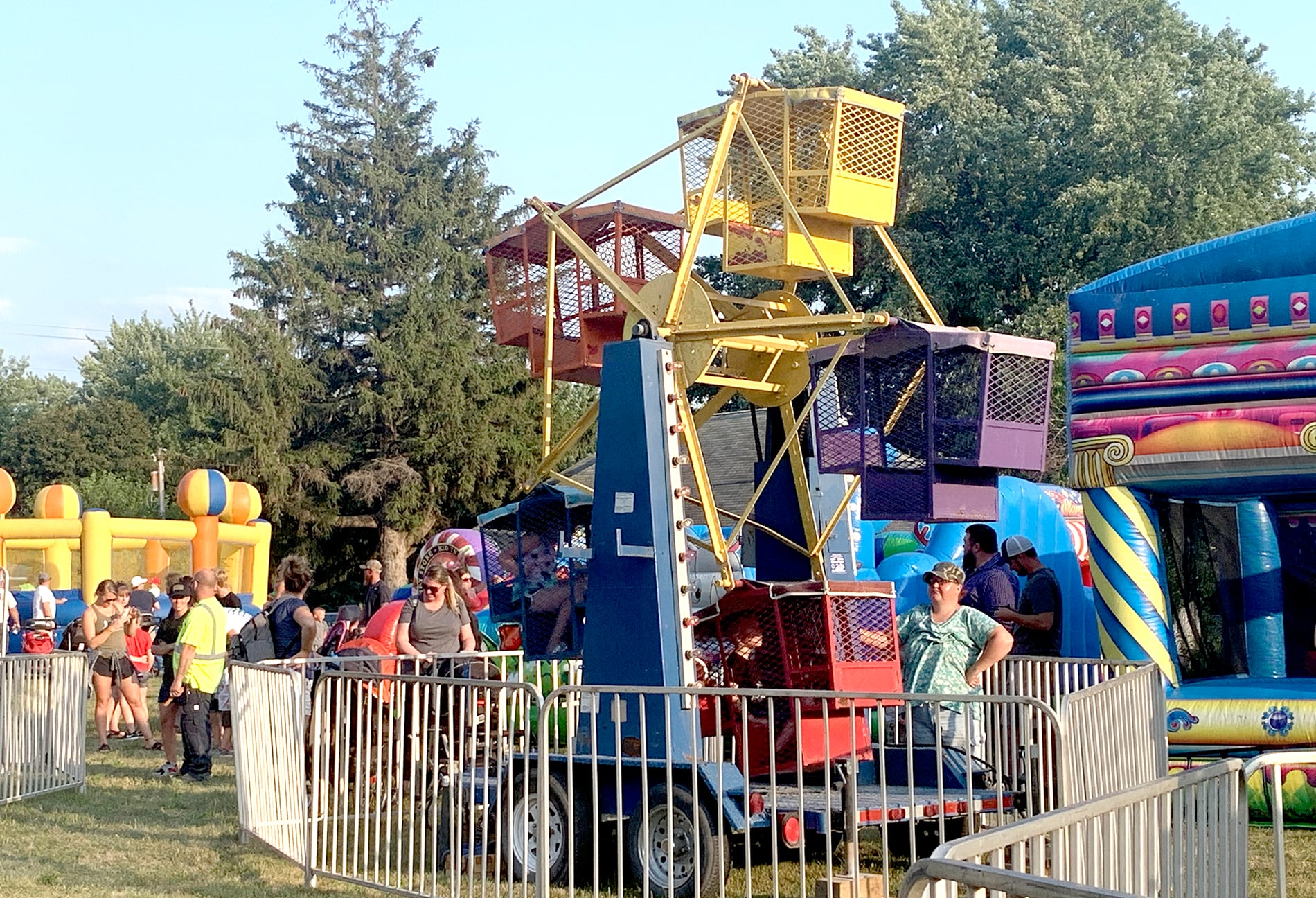 Pumpkin Days-goers enjoy the carnival at last year's festival in Orient.