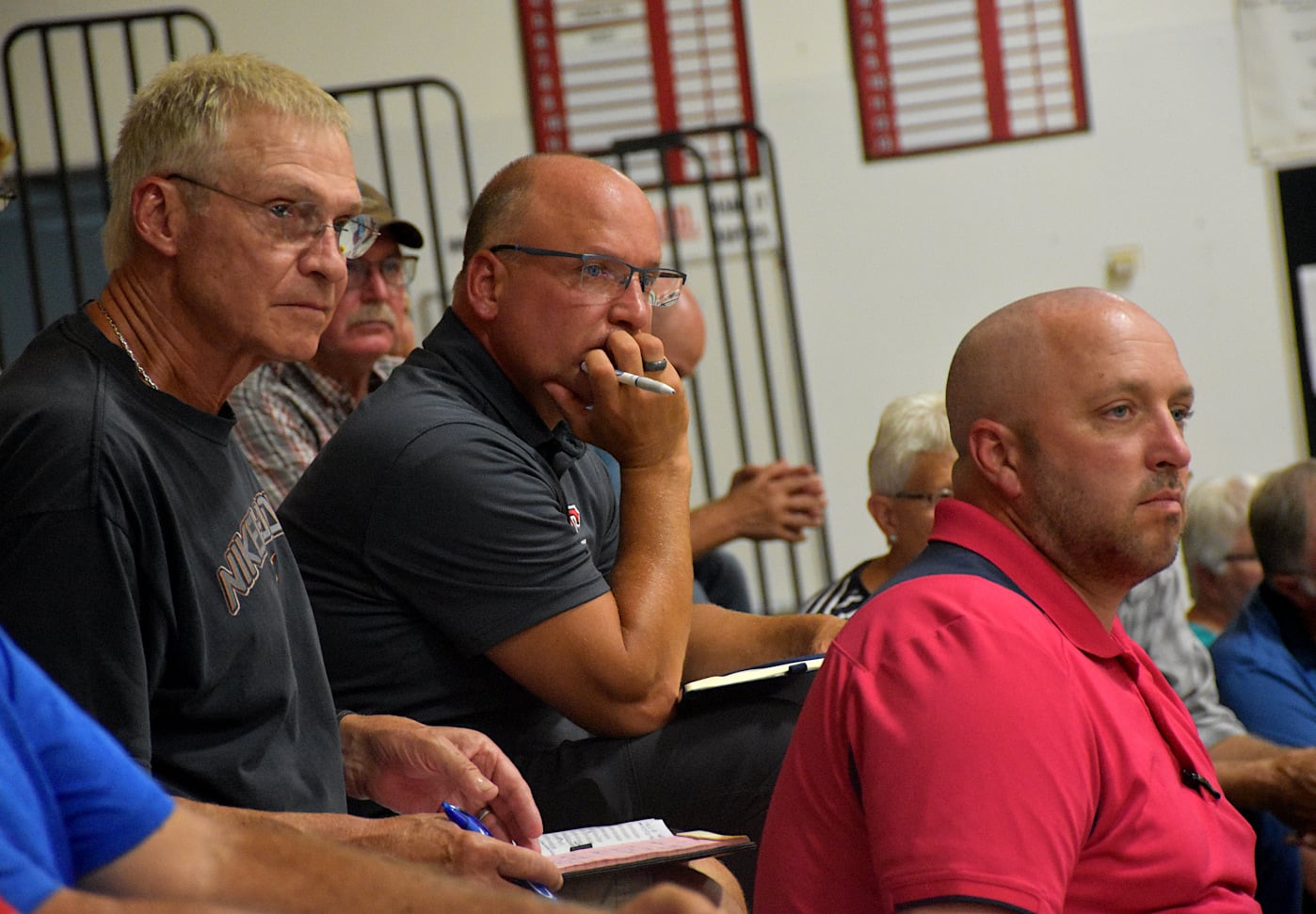 Creston school board president Galen Zumbach, Superintendent Deron Stender and transportation director Scott Busch listen to comments Monday. Creston and Winterset schools filed objections to how the Orient-Macksburg territory was proposed to be distributed to adjacent districts.