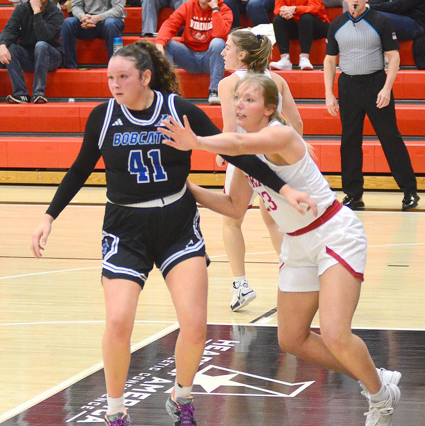 Grand View's Brianna Fields of Creston (right) defends the post during a Heart of America Conference Tournament victory over Peru State. The Vikings won the league tourney to earn an automatic bid to the NAIA national tournament.