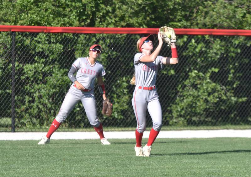 Avery Staver catches a fly ball Monday against the Chargers. Her out-of-the-park catch robbed Chariton a game-tying run in the seventh inning.