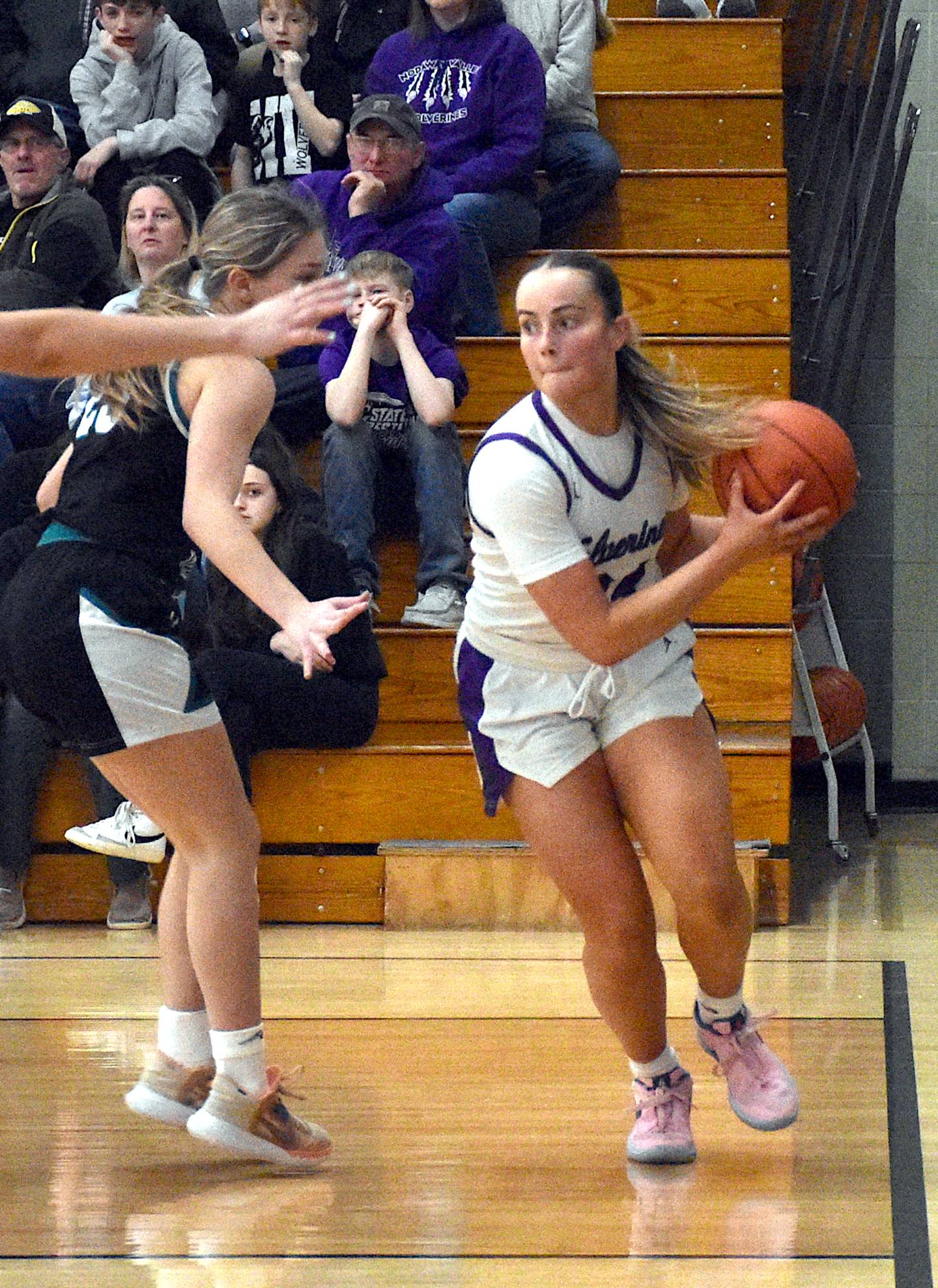 NV senior Lindsey Davis drives the baseline to find a teammate to pass the ball out to during a regional semifinal win against Southwest Valley Feb. 16 at Greenfield.