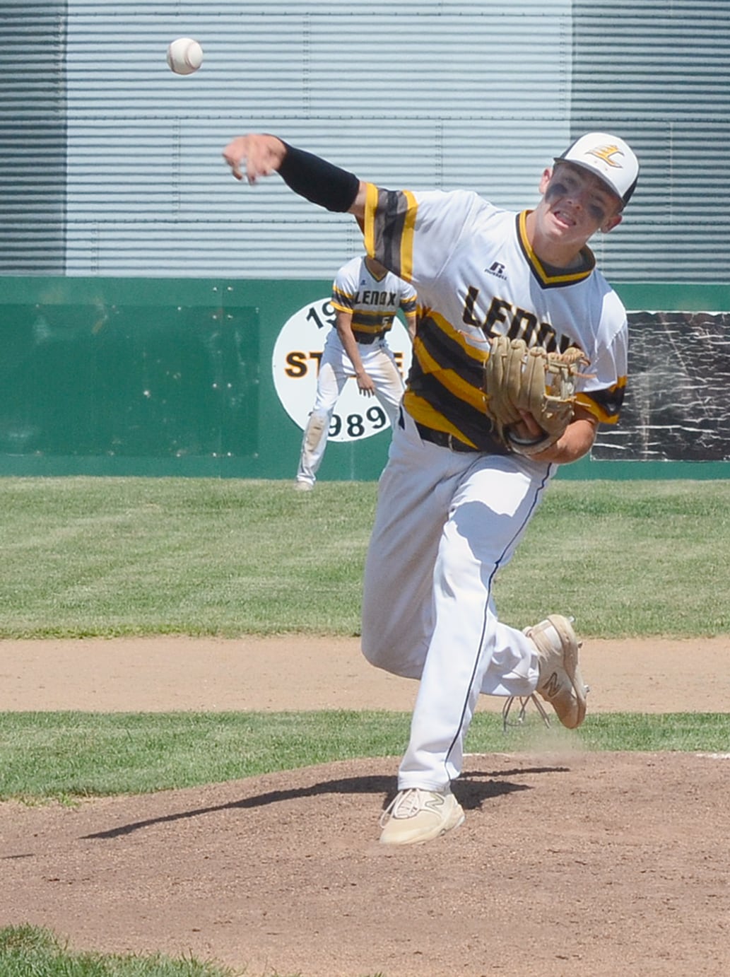 Lenox senior Carter Reed sends a pitch to the plate during his five-inning perfect game in the Tigers' 10-0 win over Sidney. Reed struck out 10 of the 15 batters he faced.