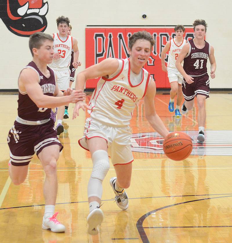 Cael Turner leads a Creston fast break against Shenandoah Tuesday night. The senior point guard finished with 14 points, five steals and four assists in the 64-31 victory.