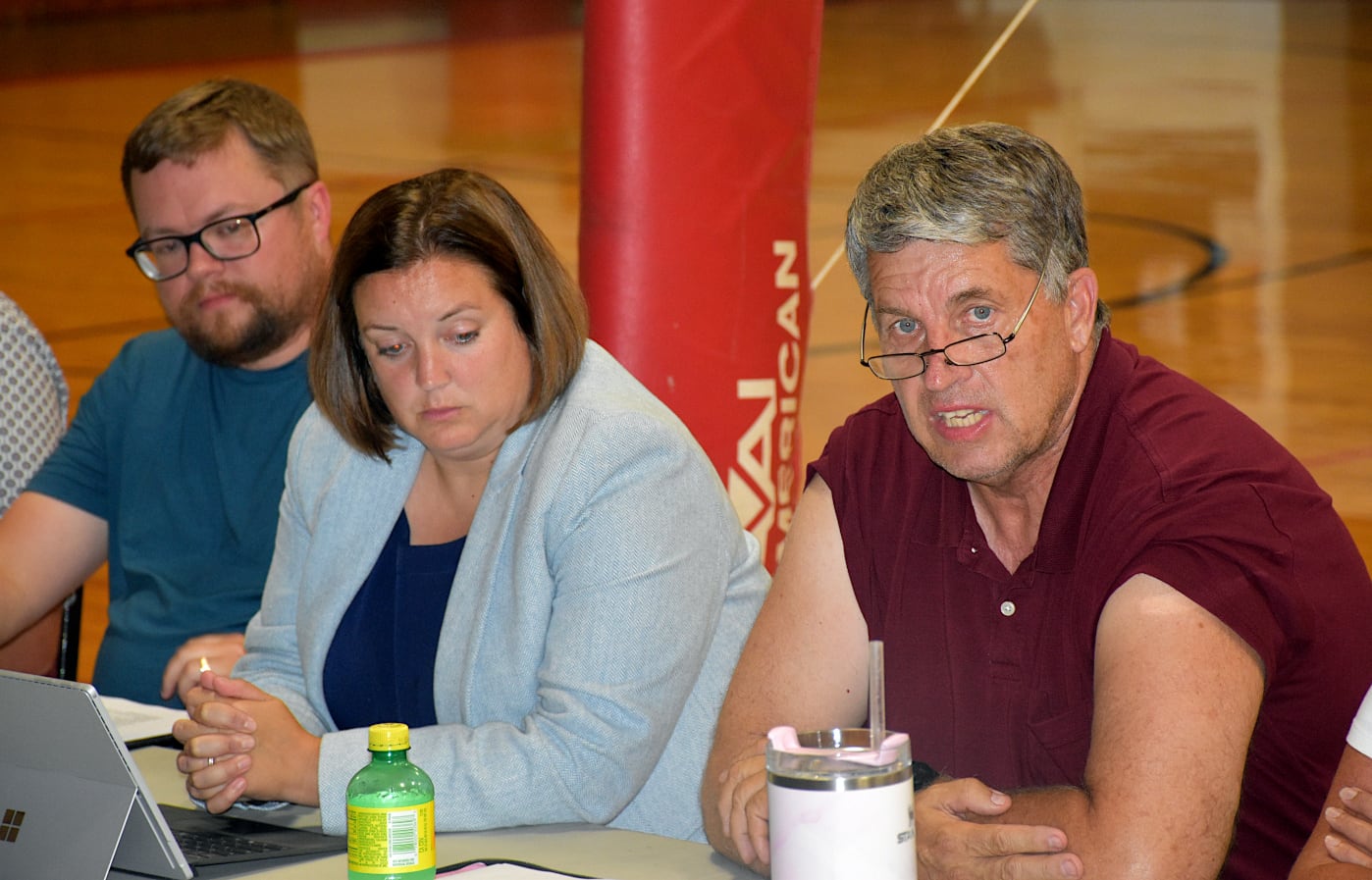 Orient-Macksburg Superintendent Jeff Kruse, right, explains Monday how the school district may operate since the Sept. 10 dissolution election won't be held because of objections from Creston and Winterset districts. The Orient-Macksburg school board was planning closing the district July 1, 2025. To his right are district attorney Carrie Weber and dissolution committee chairman Ryan Frederick.