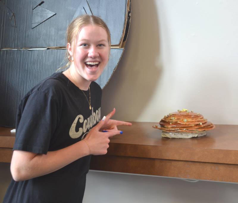 SWCC student Emily Strait wither her ceramic pancakes at the Restored Depot.
