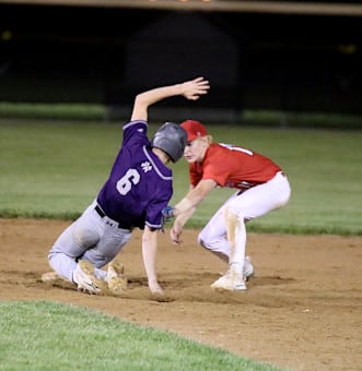 Nodaway Valley's Paul Berg tries to avoid the tag at second base.