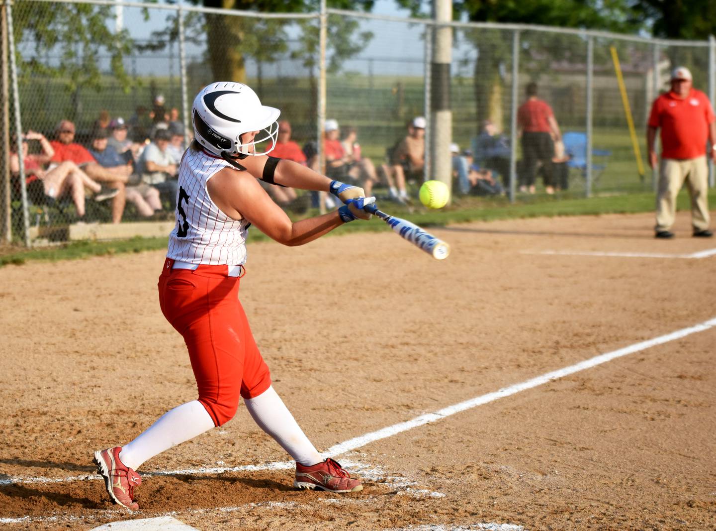O-M senior Kasyn Shinn connects for a one-run double Wednesday in their regional opener against Stanton. The Bulldogs won 11-1 in five innings.